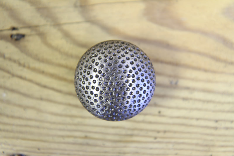 Cabinet Dimpled Knob. Celtic Finish. 33mm. Supplied with fixings.